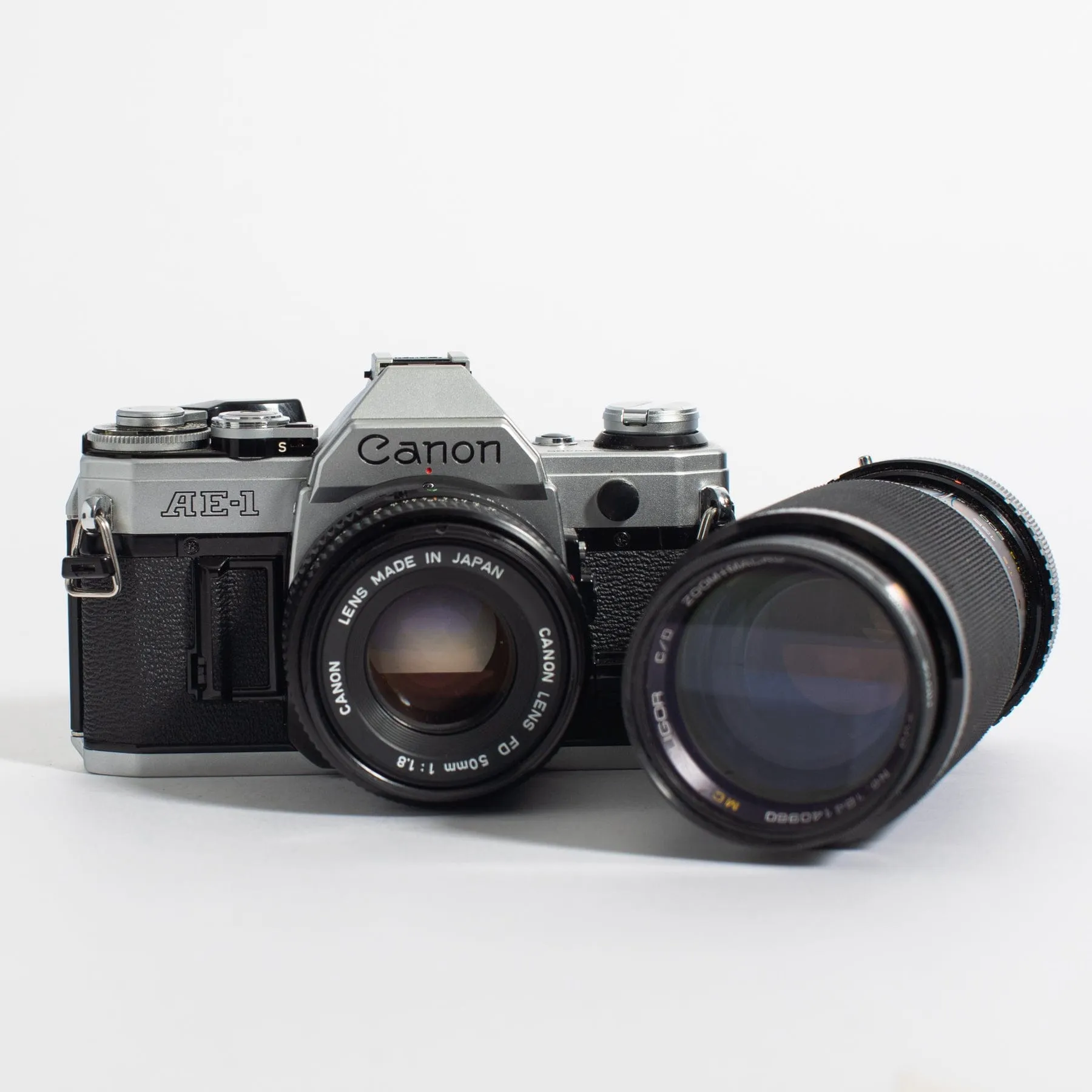 Canon AE-1 w/ 50mm FD f/1.8 and bonus telephoto zoom lens, body no. 1569485